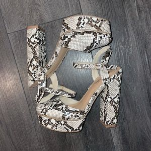 Brand new Snake skin Heels